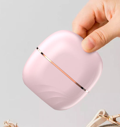 Mini wireless portable hair straightening comb